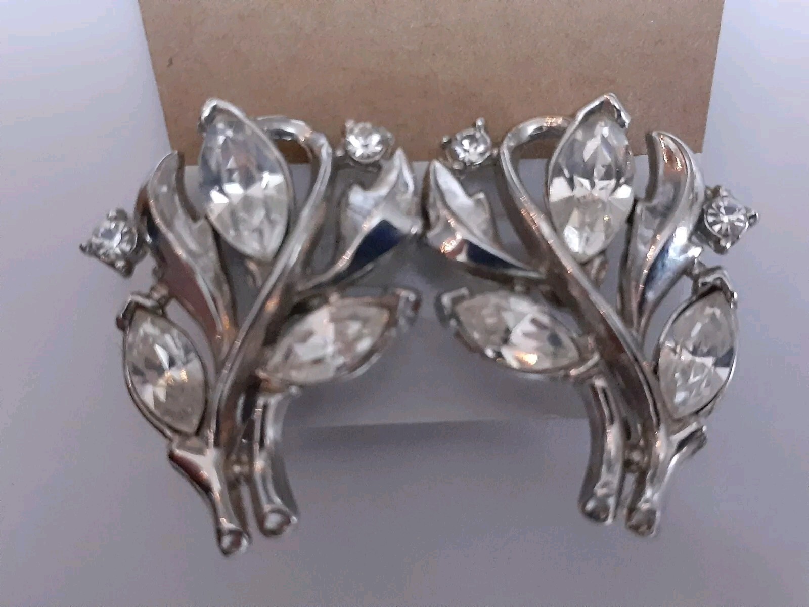 Vintage Crown Trifari rhodium plated marquise cut rhinestone clip on earrings