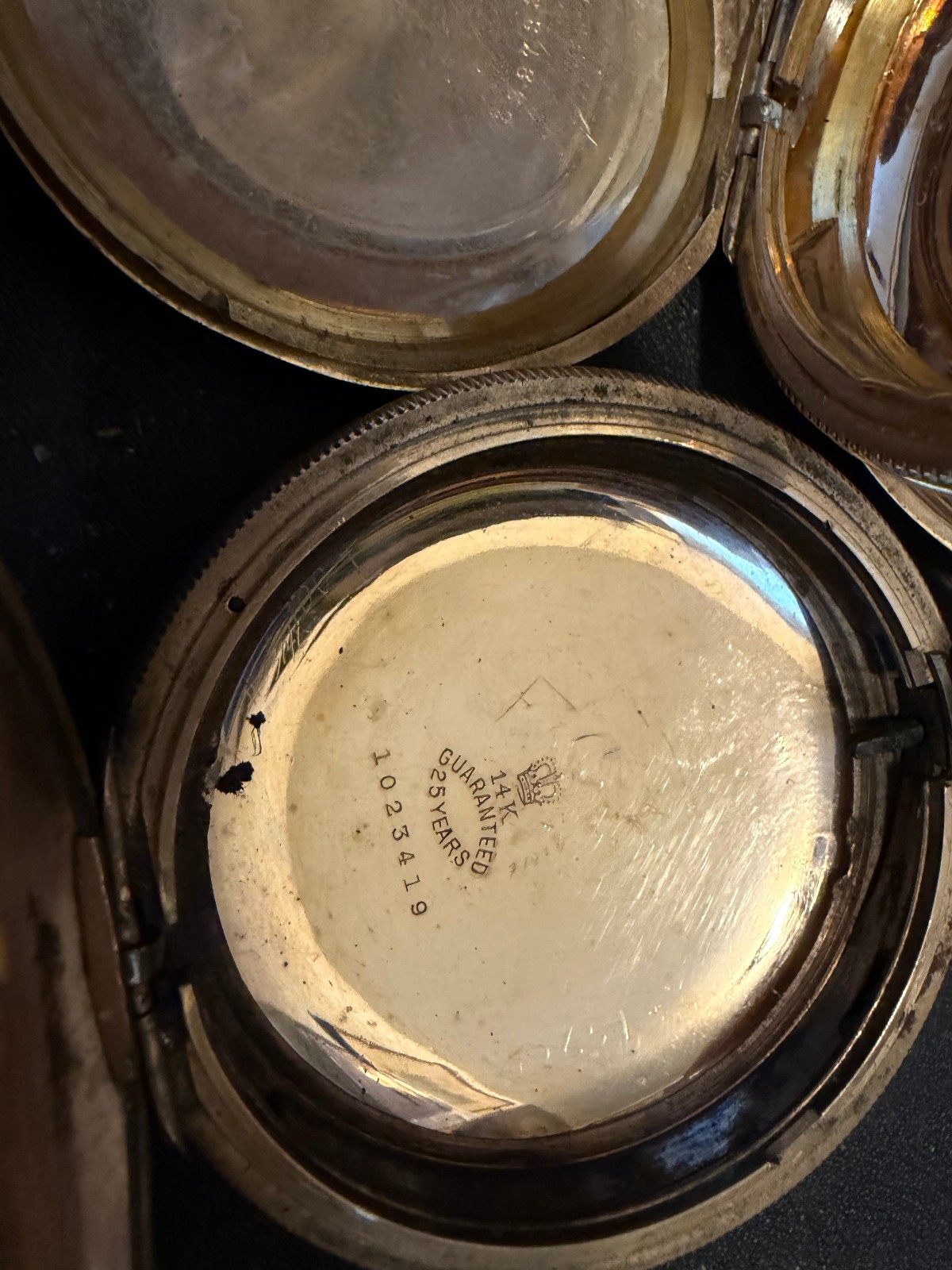 243 grams gold filled pocket watch cases. all marked “25 years”
