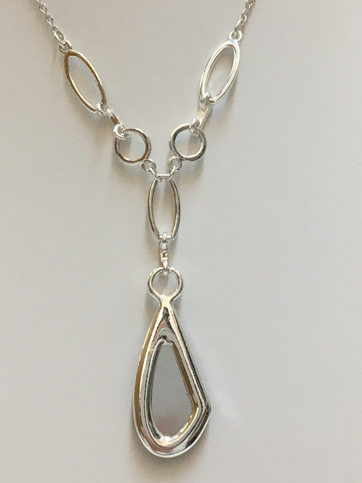Silver Tone Necklace Blue Faceted Teardrop Pendant And Clear Rhinetone Accents