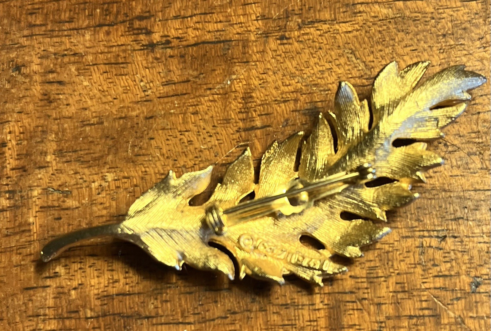 9 Vintage Signed Gold Toned Brooches (Coro, Kramer, Tifari)