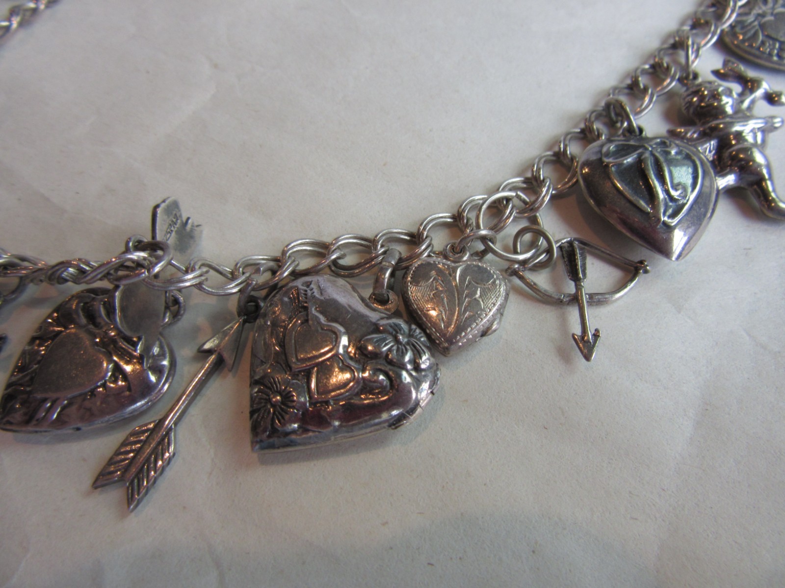 Vintage double link chain necklace with 22 heart, love themed charms 61.8 grams