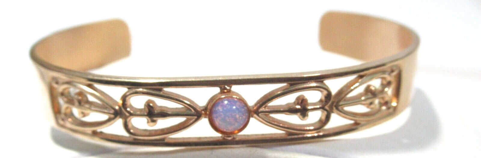 AVON GOLD TONE CUFF BRACELET WITH FAUX FOIL OPAL DESIGN VINTAGE