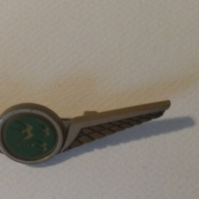 Stoffel Seals Signed Wing Brooch Pin Gold Tone Green Round Bezel Center
