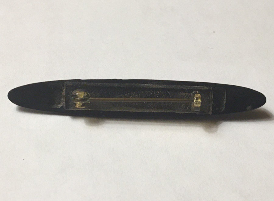 VINTAGE 2.5″ AFRICAN MASK ELONGATED HARD PLASTIC TRIBAL CELLULOID PIN BROOCH