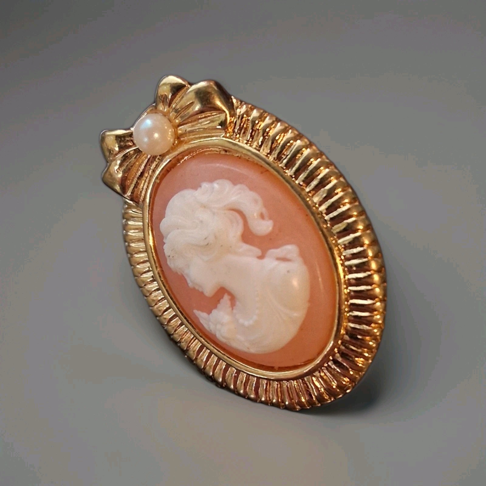 Vintage Cameo Brooch Gold Tone Oval Portrait Pin with Faux Pearl Bow Accent