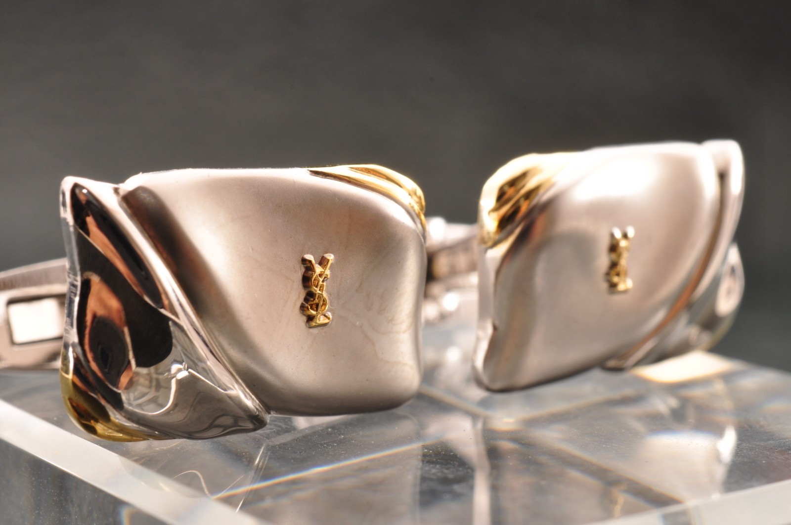 Near mint, gold and Cufflinks and silver tie clip, “Yves Saint Laurent”, case.