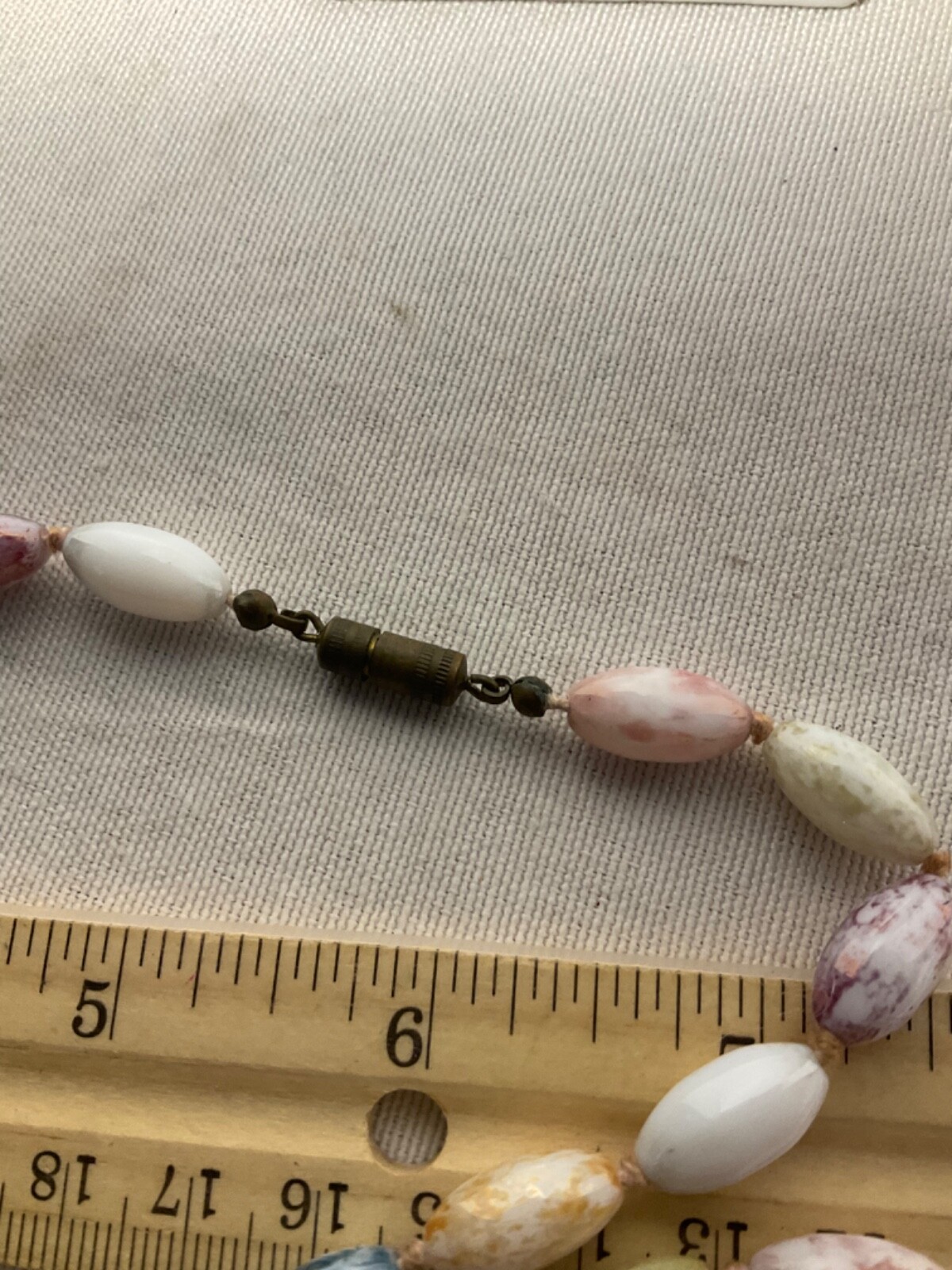 Necklace glass oval shaped beads approximately 50”