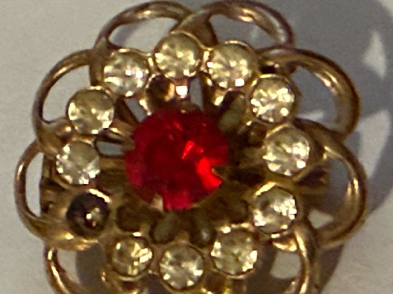 Old, vintage gold tone rhinestone brooch