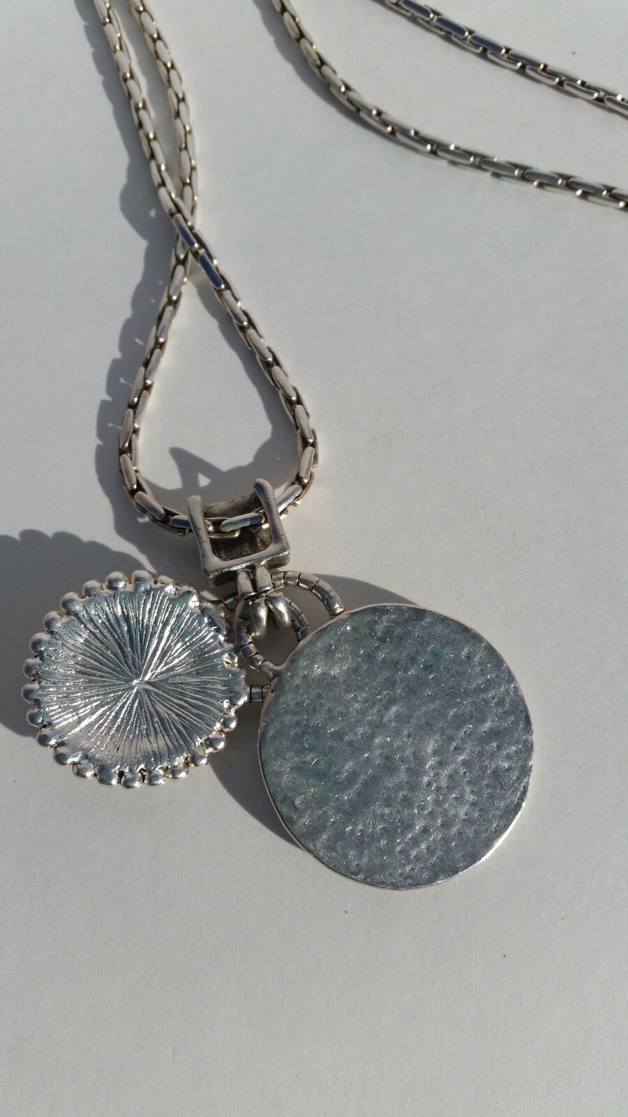 Blue Tiger Eye Cabochon style pendant with a convex formed silver toned reverse