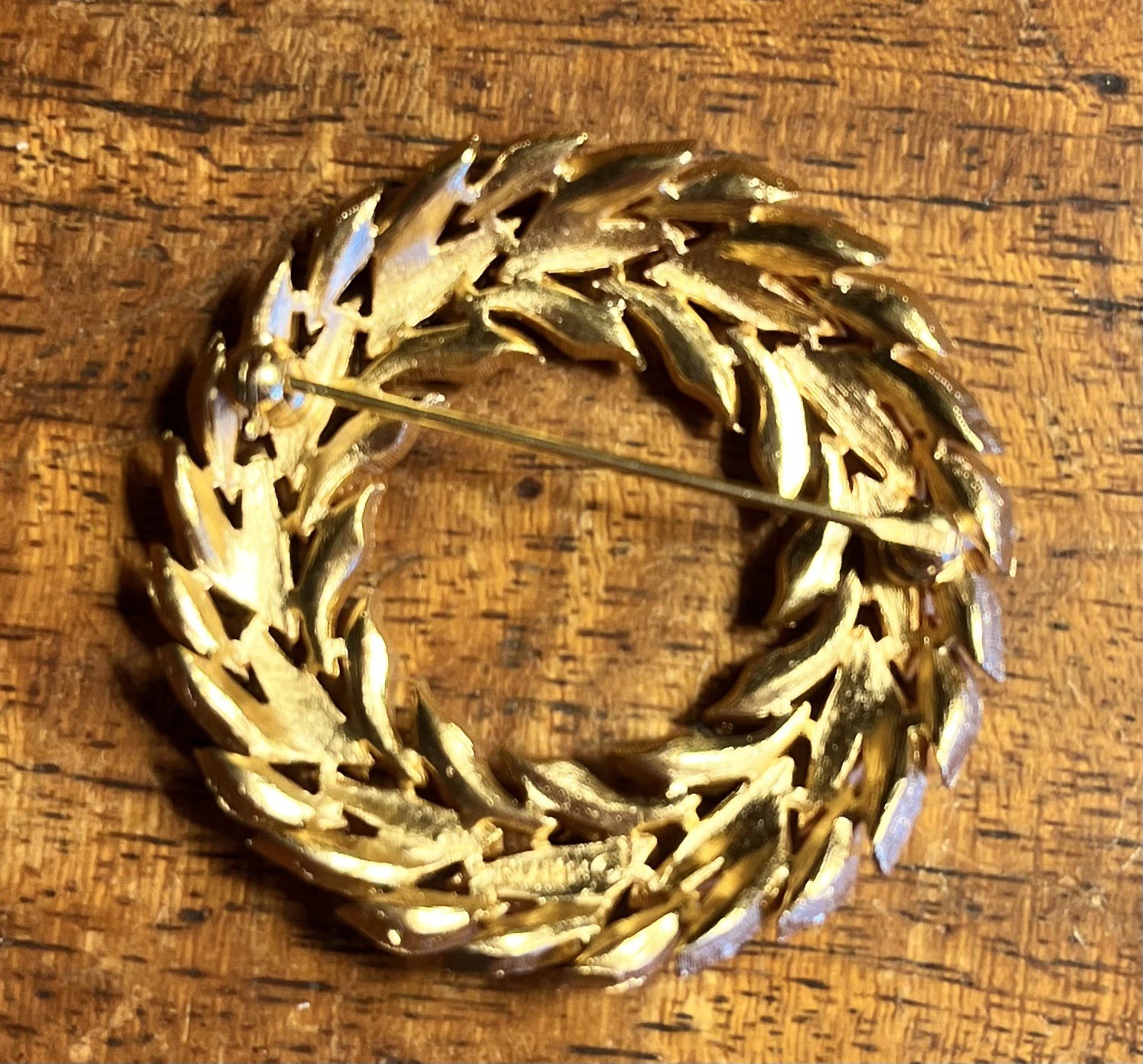 9 Vintage Signed Gold Toned Brooches (Coro, Kramer, Tifari)