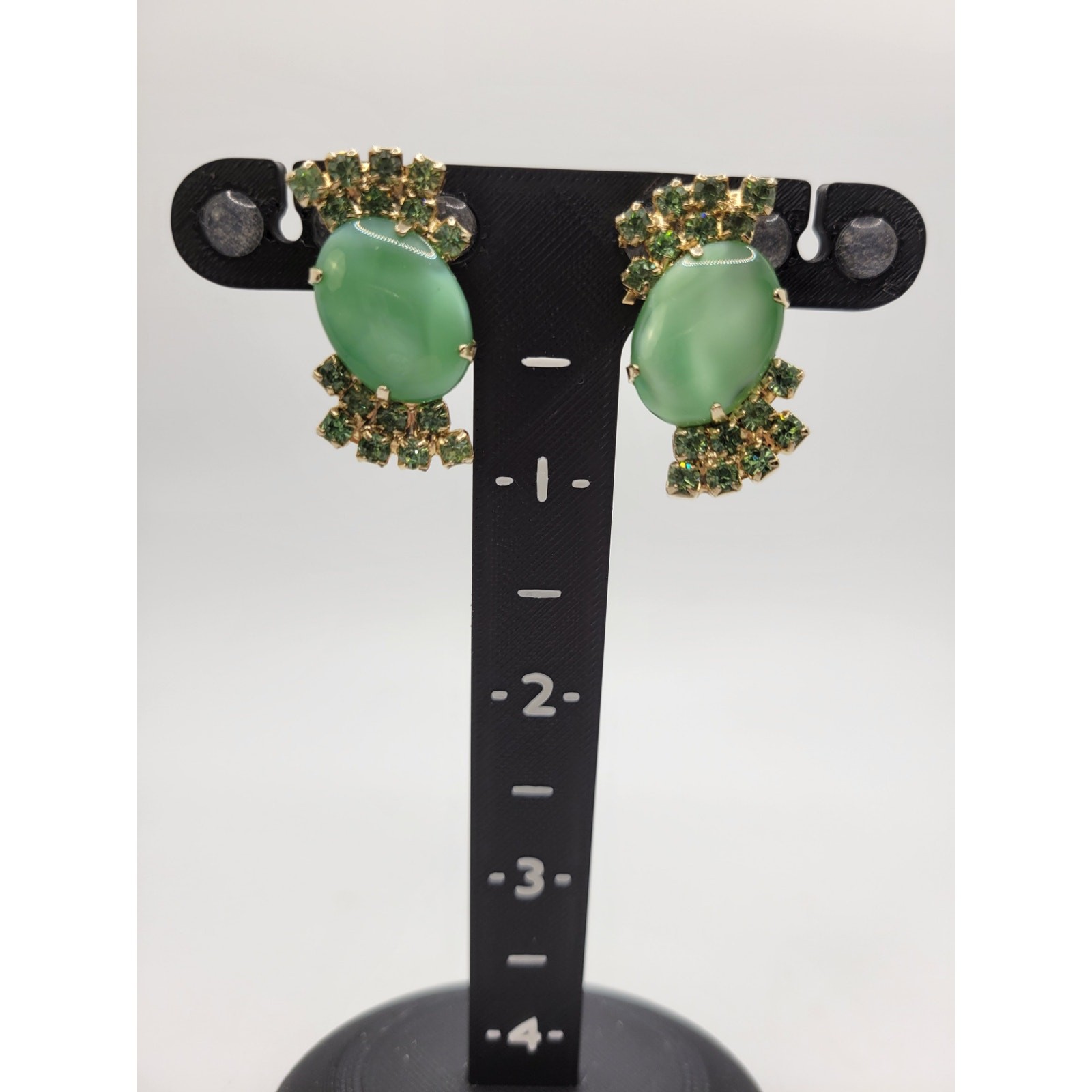Light Green Glass Rhinestone Clip On Earrings Goldtone Prong Set Stones Gorgeous