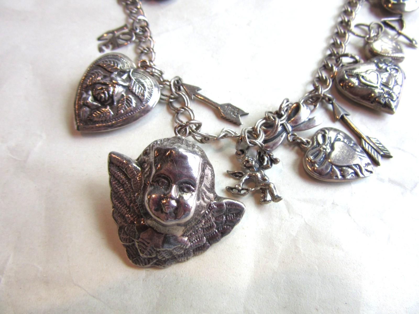 Vintage double link chain necklace with 22 heart, love themed charms 61.8 grams