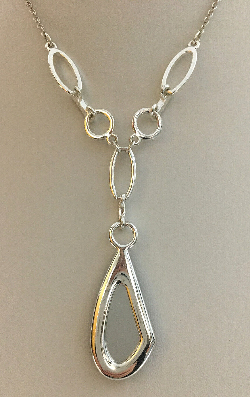 Silver Tone Necklace Blue Faceted Teardrop Pendant And Clear Rhinetone Accents