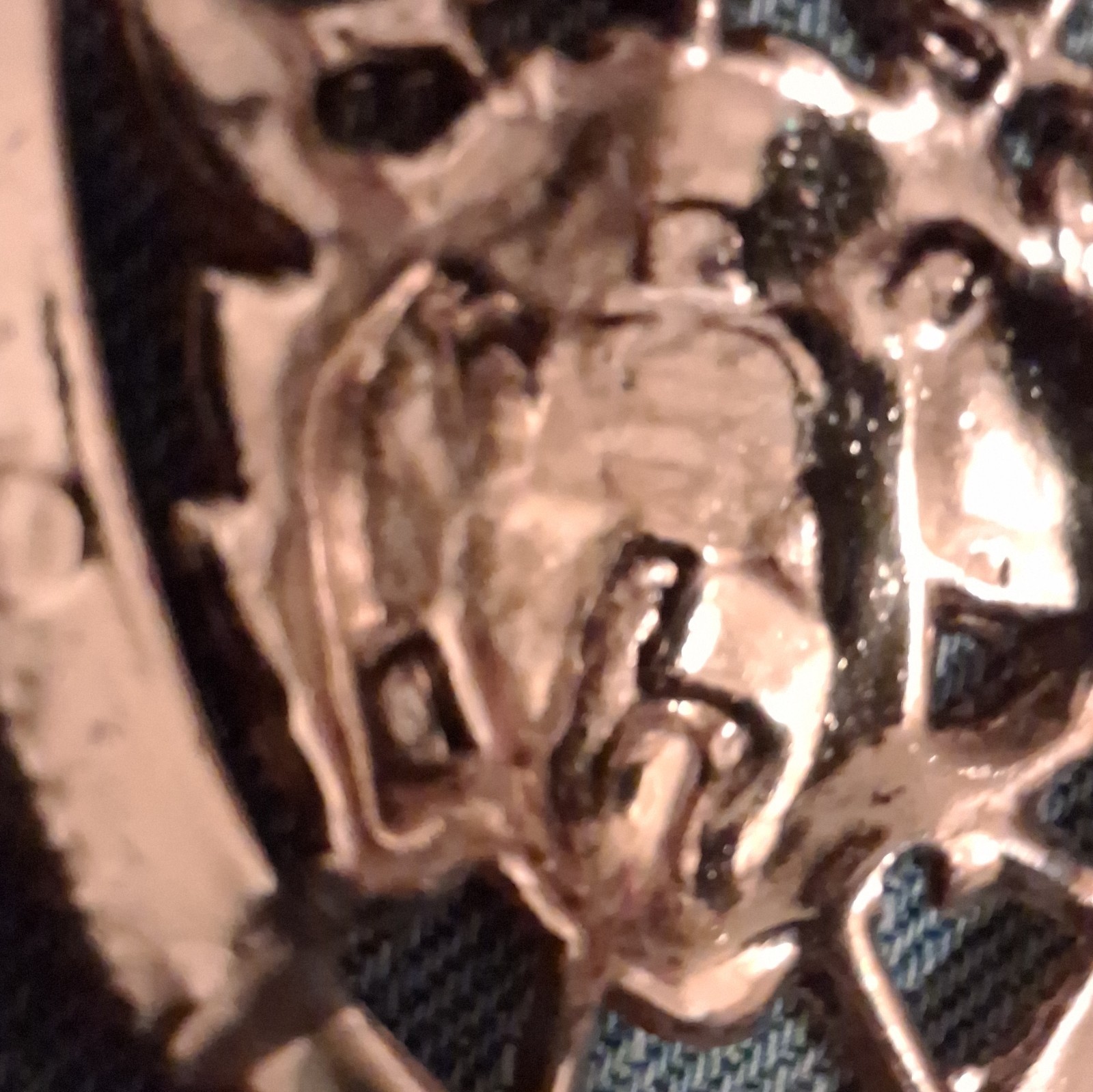 Silver Tone Shield Pin with Raised Animal Head Design, No Stone