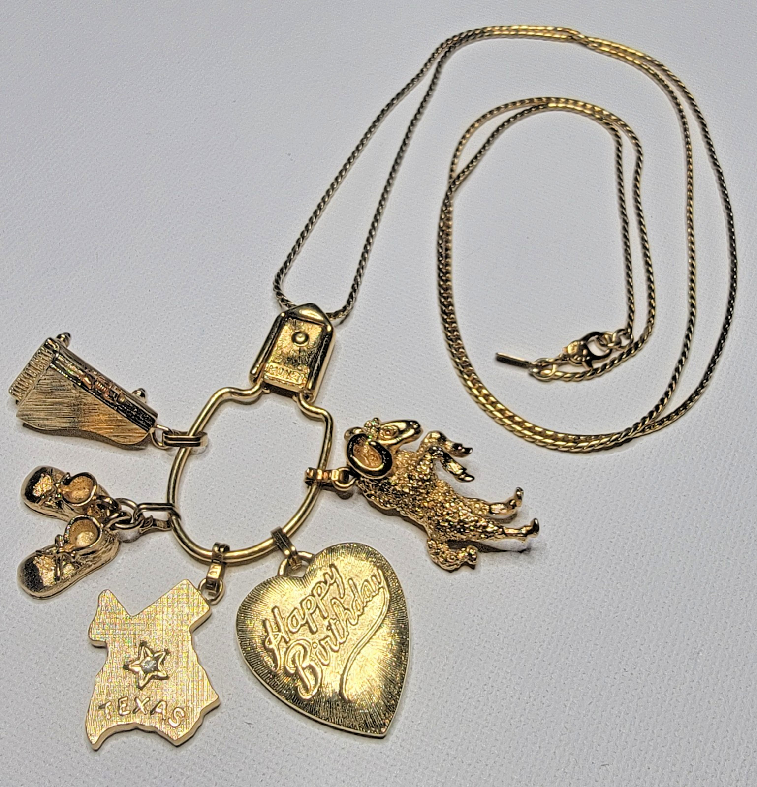 VTG 1970s MONET Gold-Tone CHARM Holder Necklace Texas Ram Piano Birthday Shoes