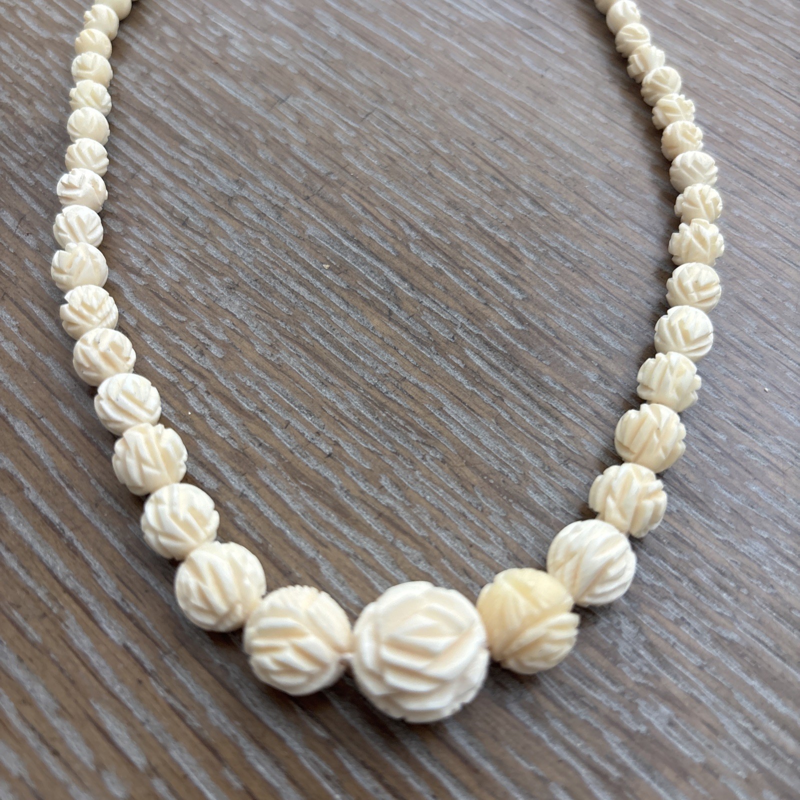 Vintage Hand Carved Bleached Graduated Bead Necklace 18″