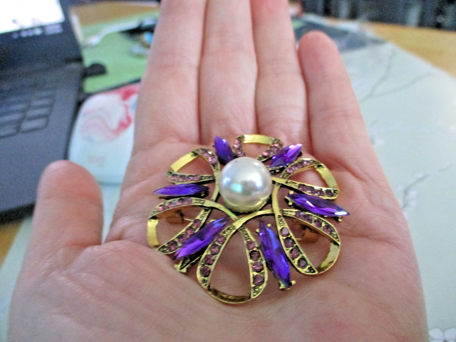 Beautiful Gold Tone Brooch with Purple Zircons and a Faux Pearl