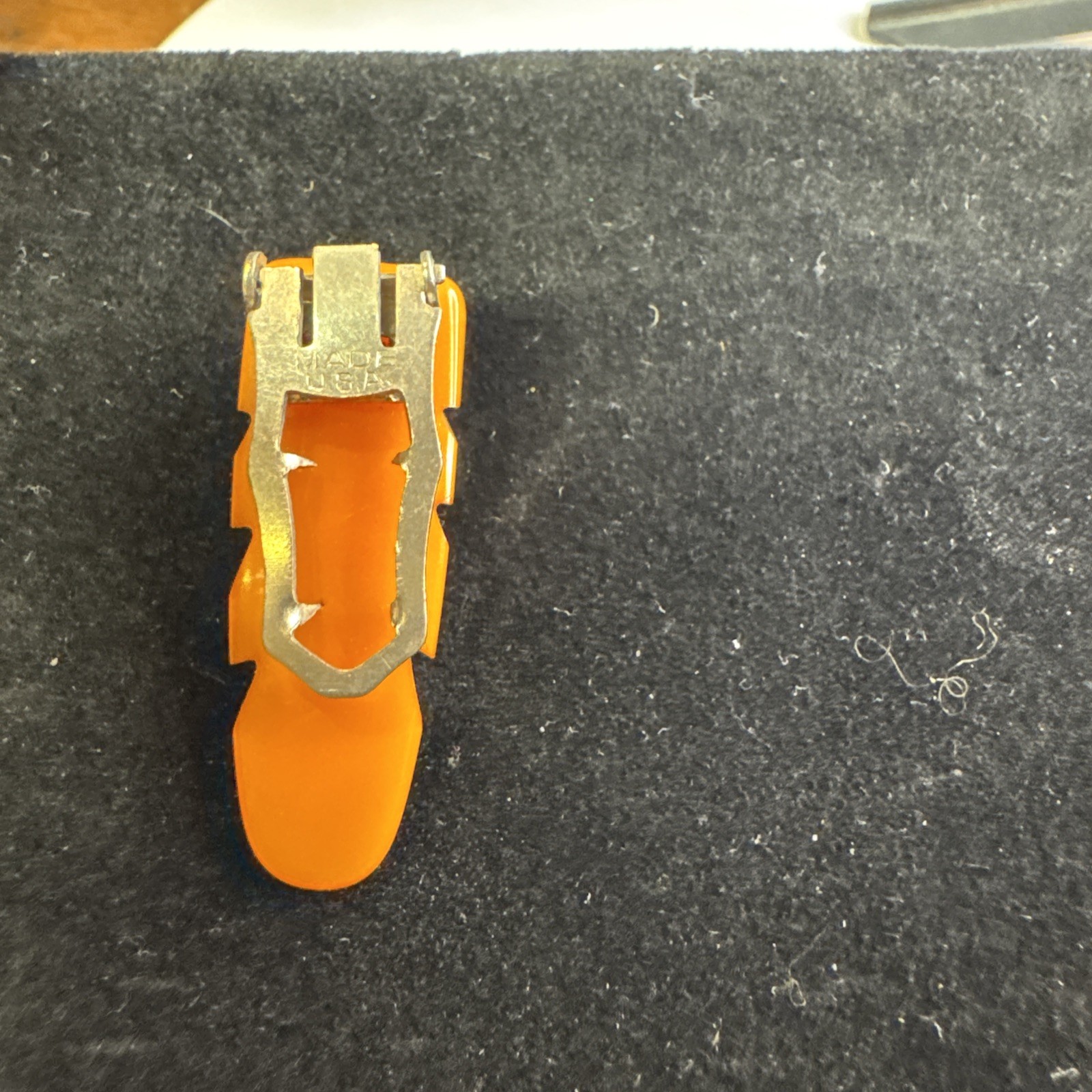 VINTAGE CARVED BAKELITE Dress Clip Butterscotch