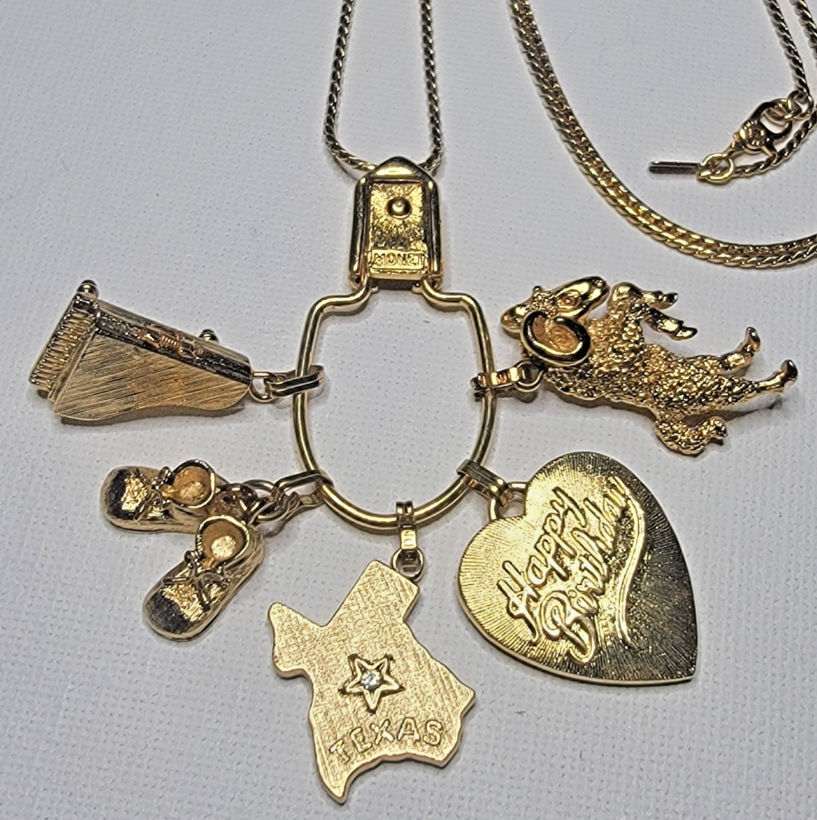 VTG 1970s MONET Gold-Tone CHARM Holder Necklace Texas Ram Piano Birthday Shoes