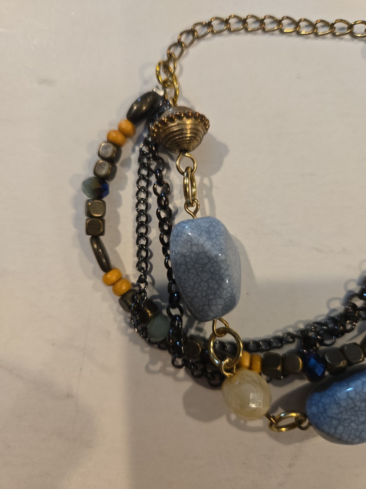 Vintage Gold Tone Multi Strand Bracelet With Blue, Wood, And Tan