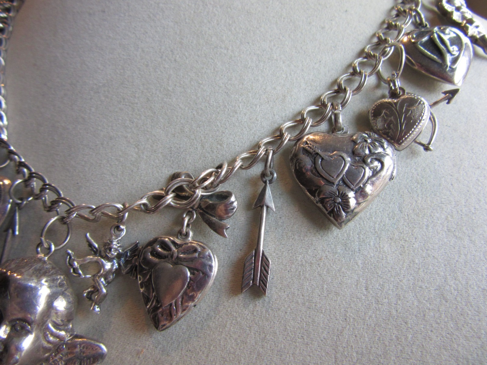 Vintage double link chain necklace with 22 heart, love themed charms 61.8 grams