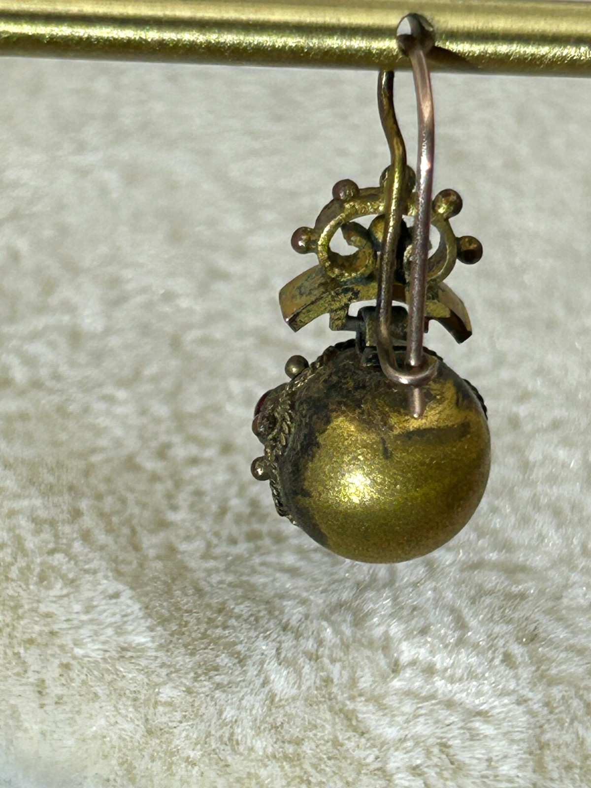 Victorian Era Circa 1880’s single dangle earring with pacer garnets.