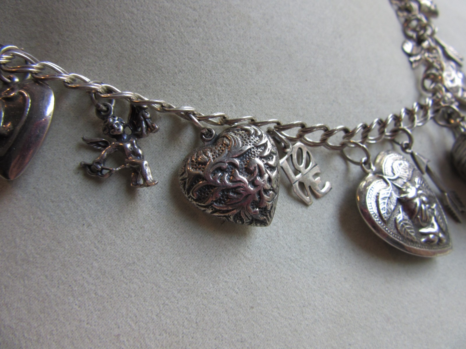 Vintage double link chain necklace with 22 heart, love themed charms 61.8 grams