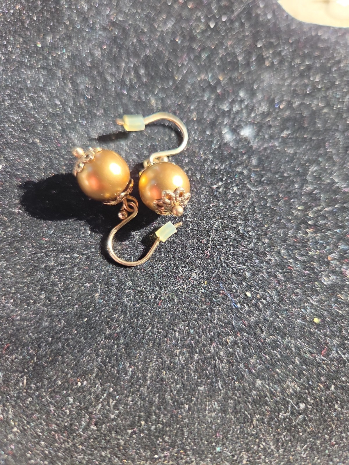 Four pairs of 10k gold plated one pair pearls clip-ons Avon.
