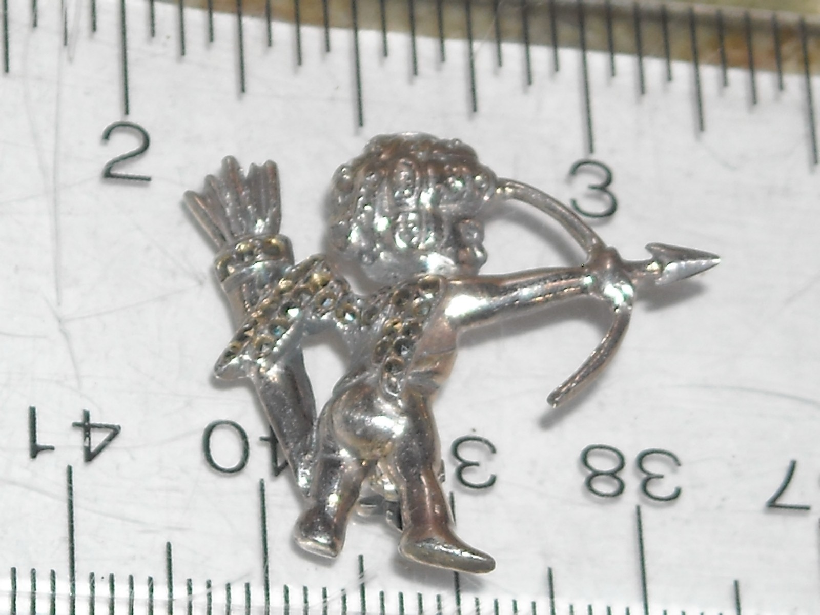vintage sterling silver Cupid bow arrows nymph sprite brooch pin marcasite