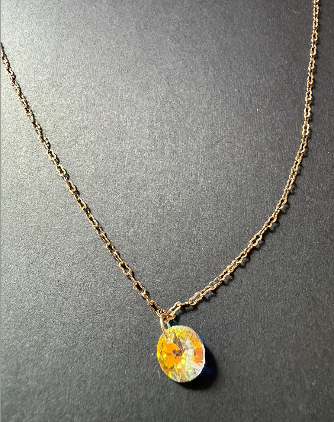 Swarovksi necklace with iridescent pendant on gold chain
