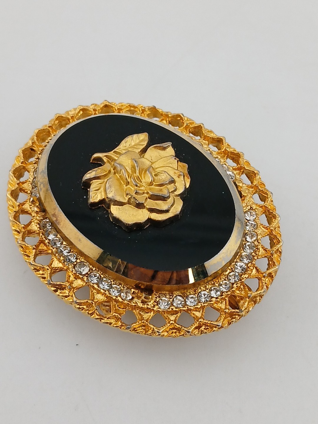 Signed CELEBRITY gold tone black glass clear stones rose cameo pendant brooch