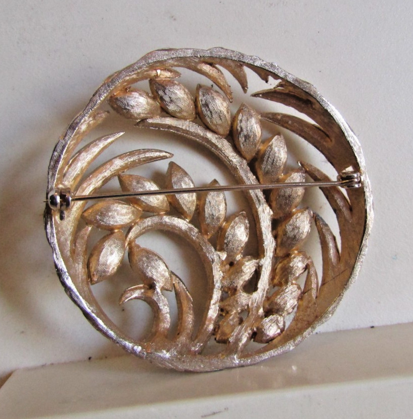 Vintage round swirly brooch pin rhinestones VG 2.25″ diameter pretty unbranded