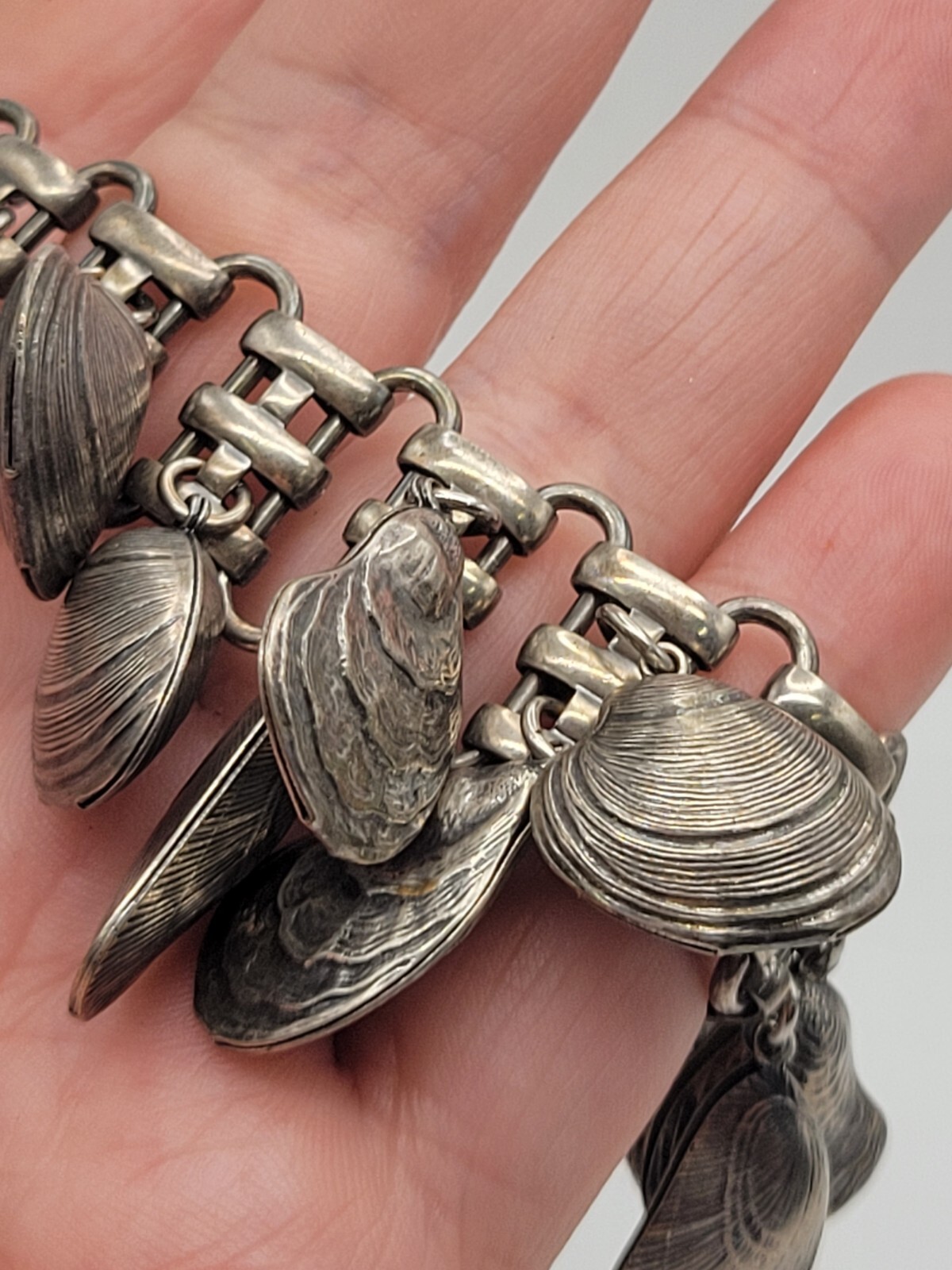 AS IS VINTAGE NAPIER EUGENE BARTOLLI SEASHELL CHARM BRACELET SILVER TONE