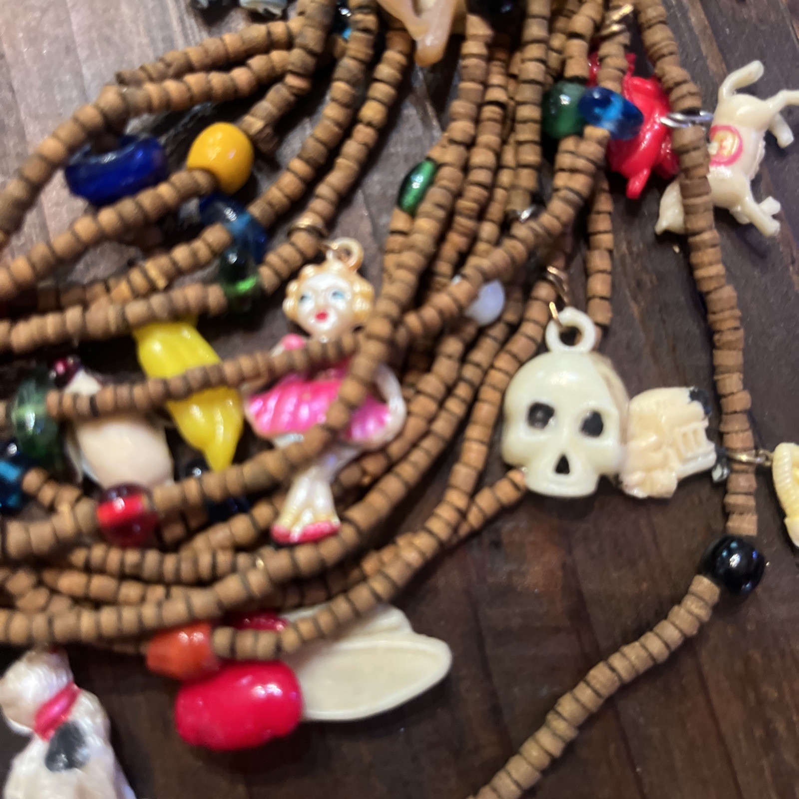 Vintage one of a kind wood bead Necklace w/ tons of celluloid charms unique cool