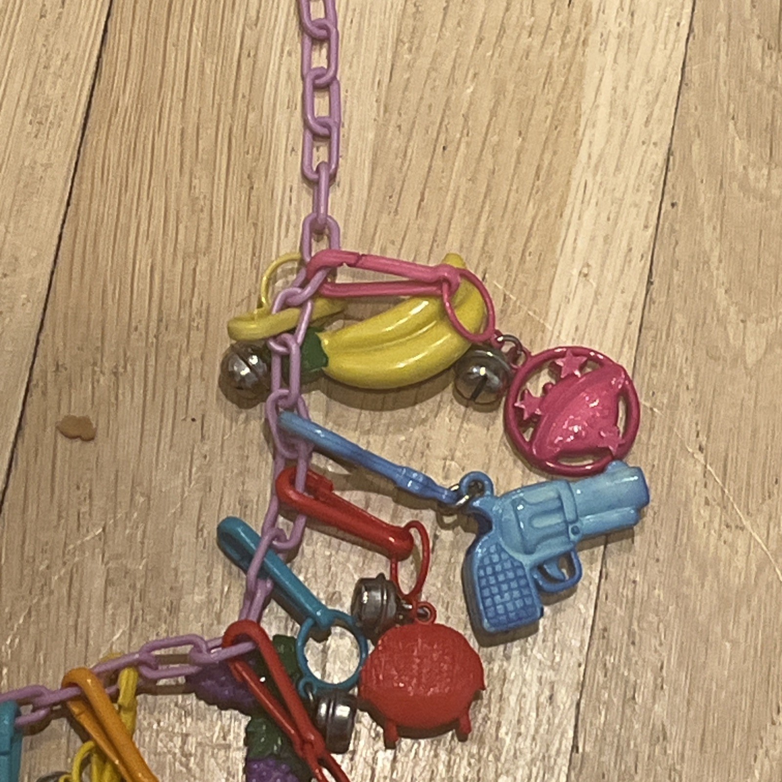 Vintage 1980s Plastic Clip-0n Bell Charm Necklace..20 charms