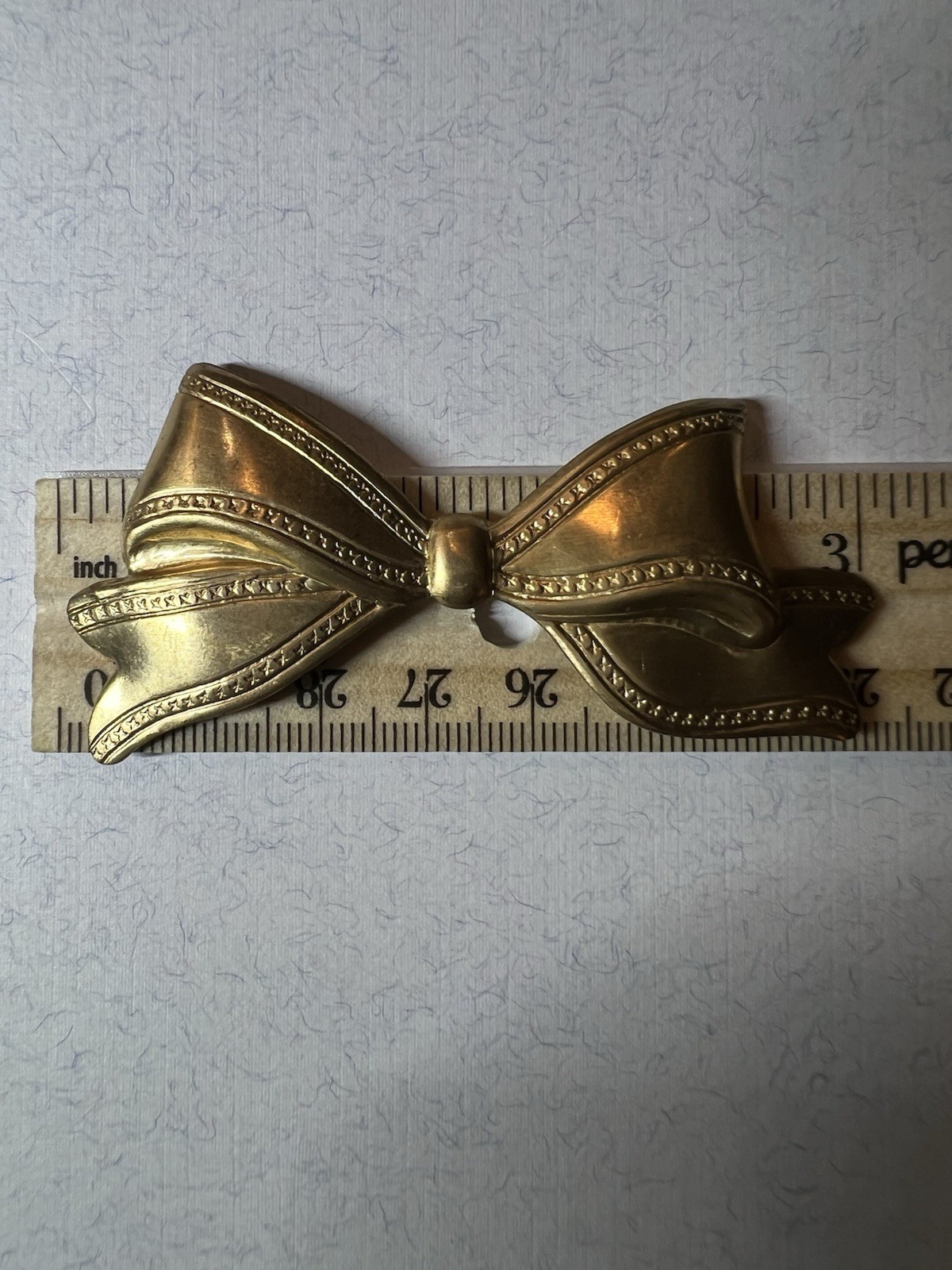 VINTAGE BOW RAW BRASS STAMPING FROM FAMOUS MAKER FOR JEWELRY/CRAFT/DECOR NOS