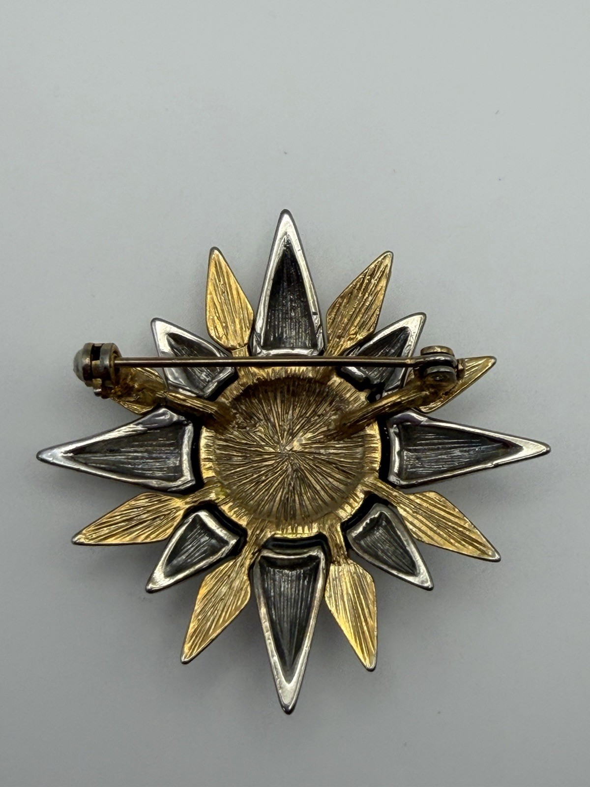 Star Sunburst Metal Brooch