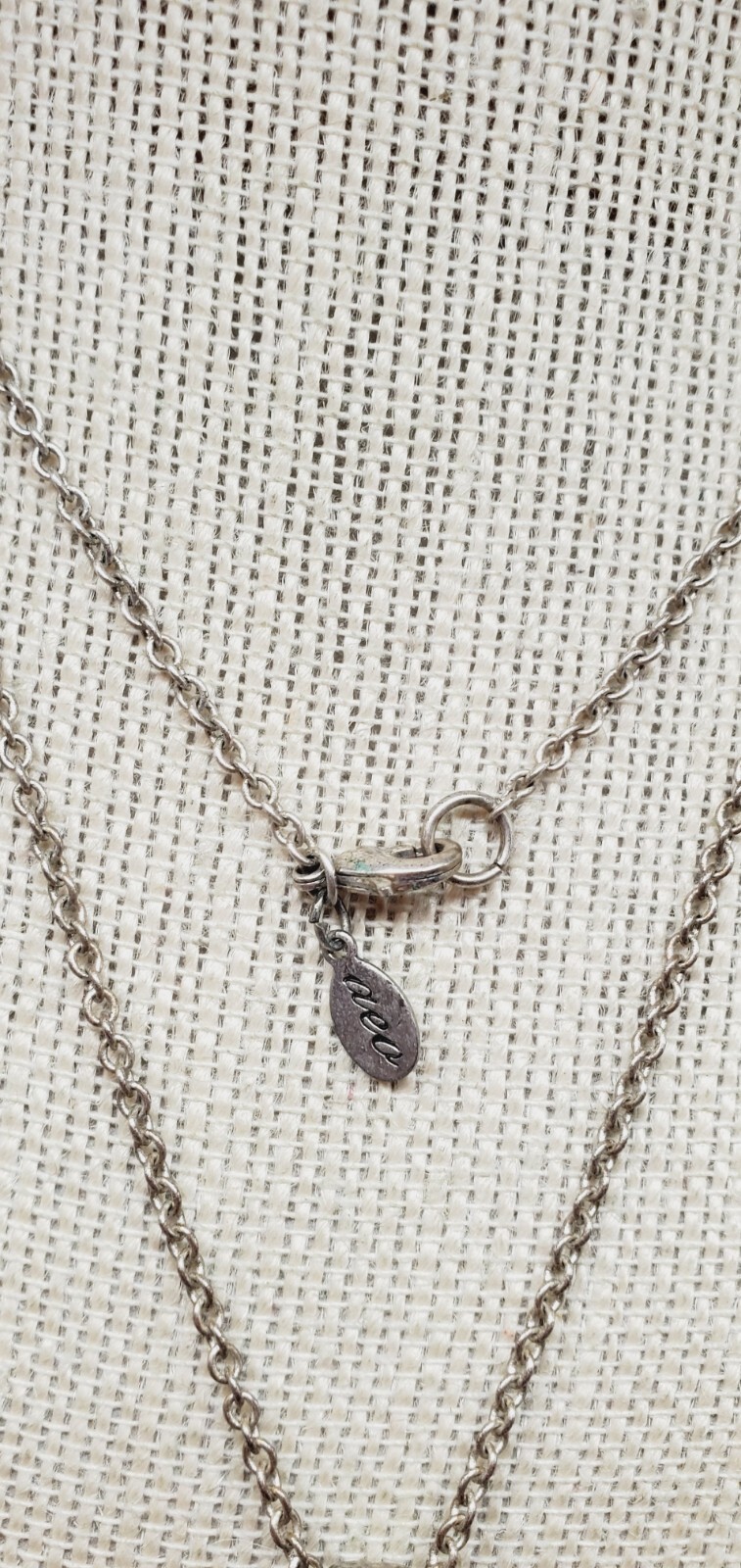American Eagle Silvertone 1.75″ multiple hearts within pendant necklace 32″ te01