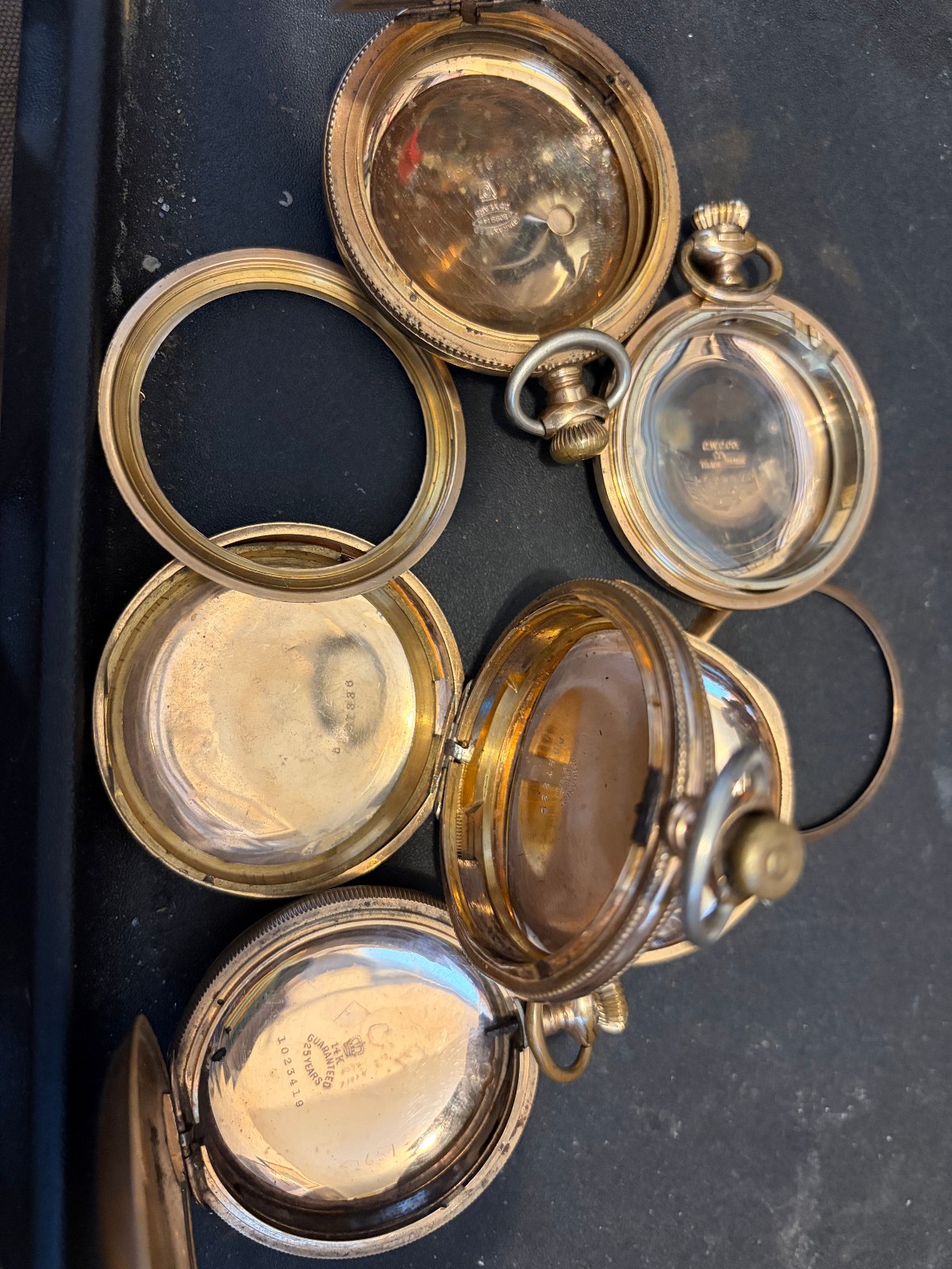 243 grams gold filled pocket watch cases. all marked “25 years”