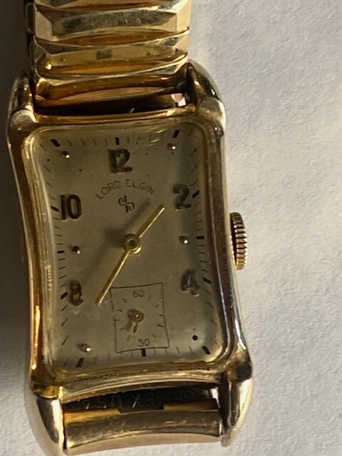 Lord Elgin 1955 14k Yellow Gold Filled Rectangular Curved Watch.run