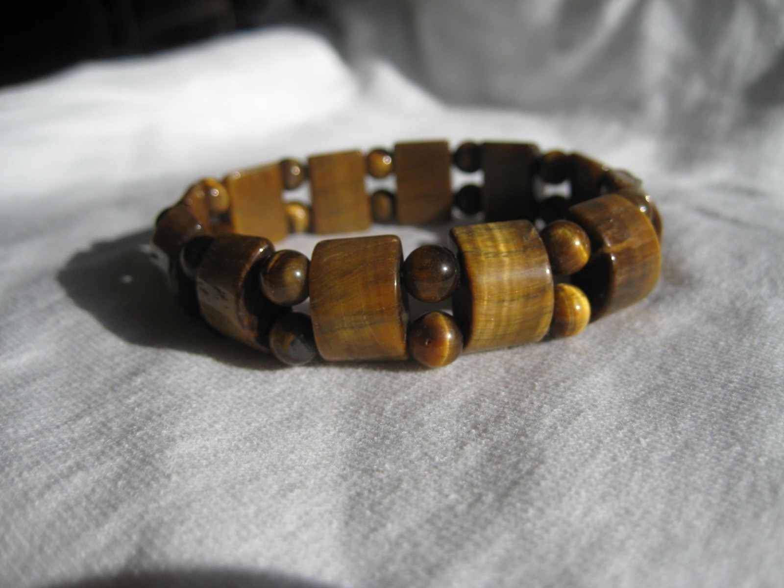 Beautiful Hand Carved Tiger Eye on durable stretch cord 5/8″ Bracelet 21