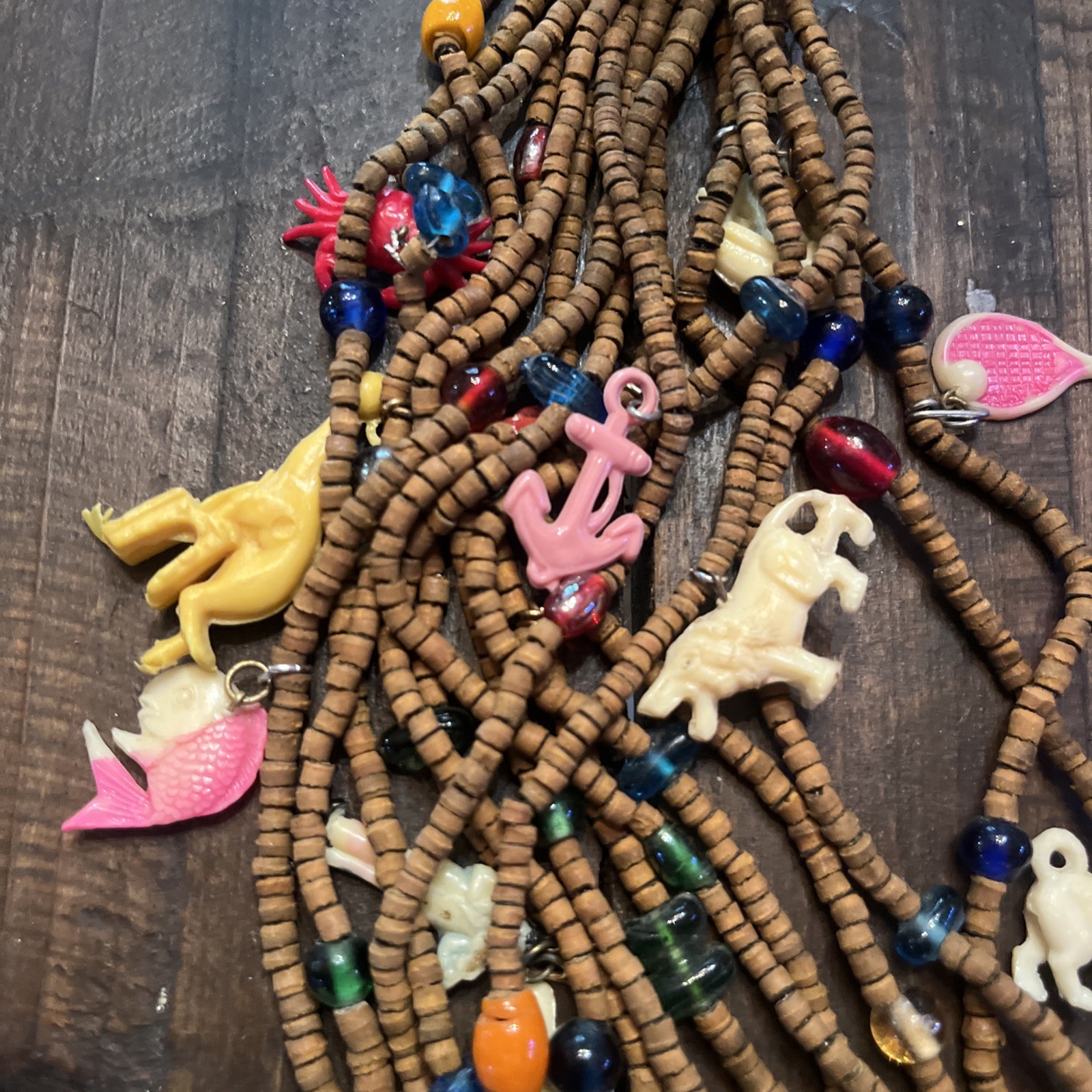 Vintage one of a kind wood bead Necklace w/ tons of celluloid charms unique cool