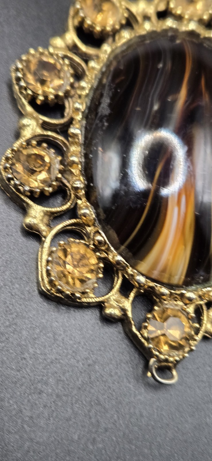 Vintage Ornate Gold Tone Oval Pendant Brown Black Stone Decorative Accents
