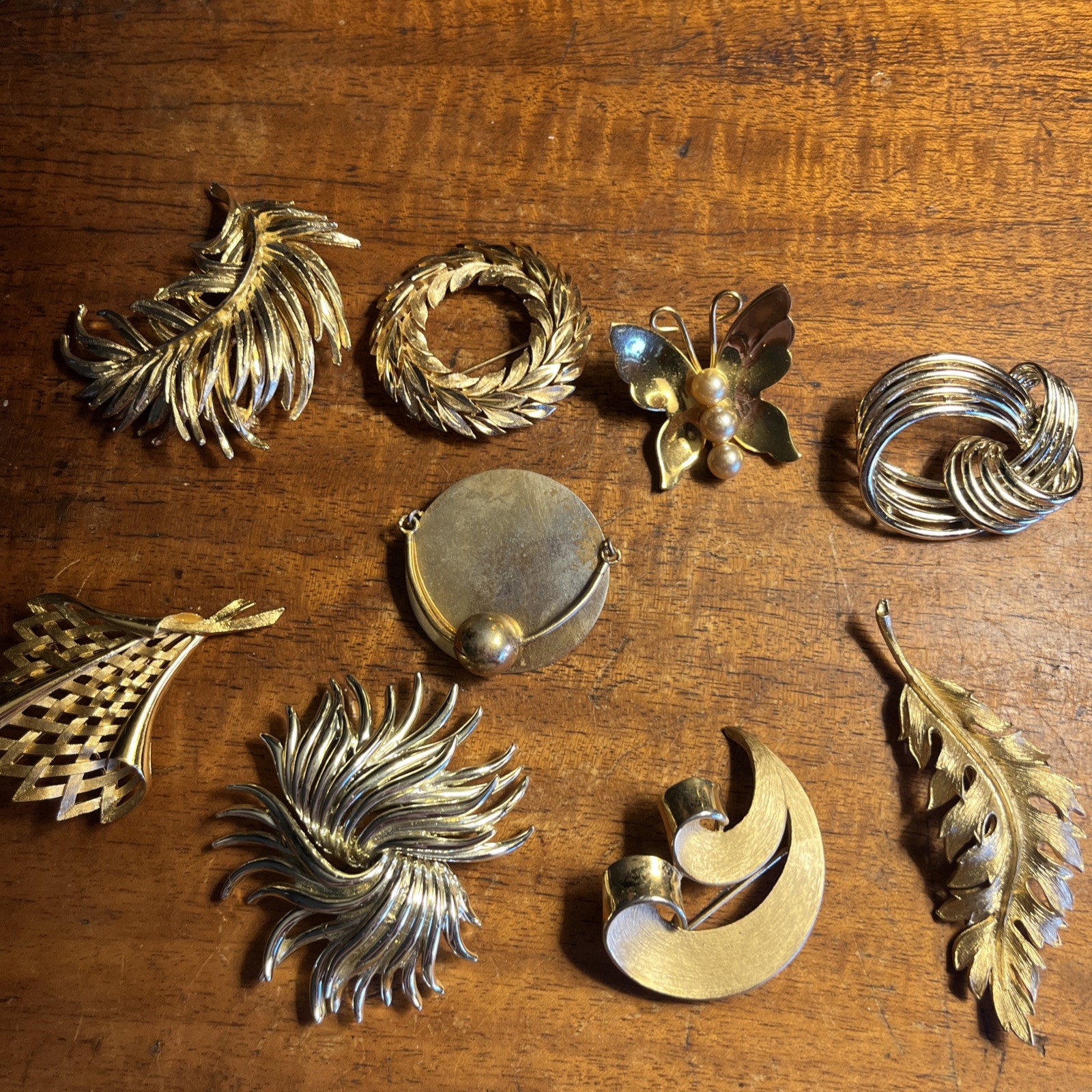 9 Vintage Signed Gold Toned Brooches (Coro, Kramer, Tifari)