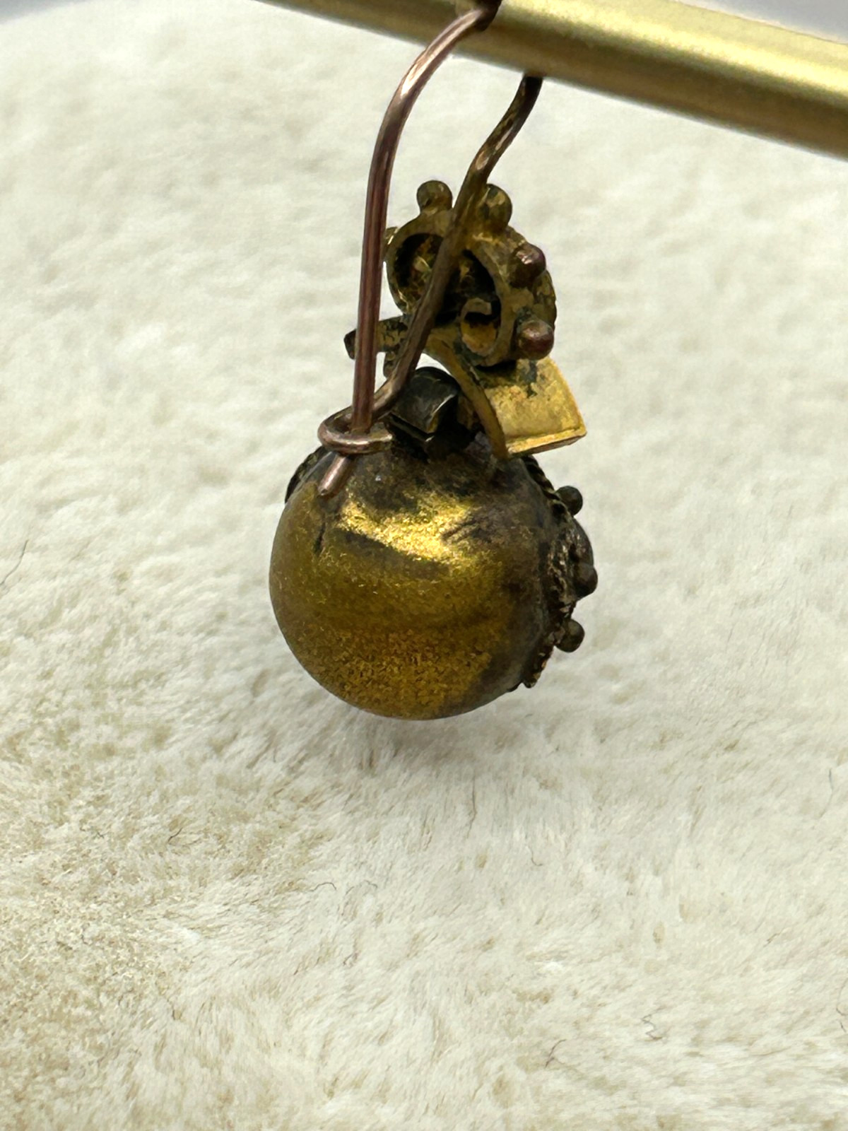 Victorian Era Circa 1880’s single dangle earring with pacer garnets.