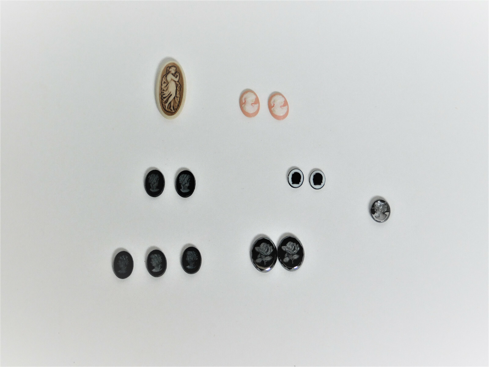 A Collection of 13 Cameos in Different Sizes