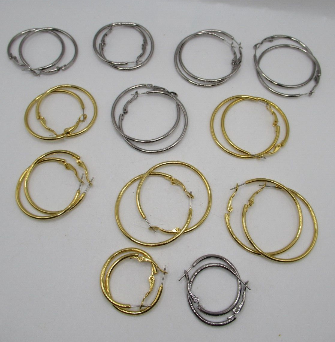 Vintage lot 12 pairs silver and gold plain hoop pierced earrings assorted sizes