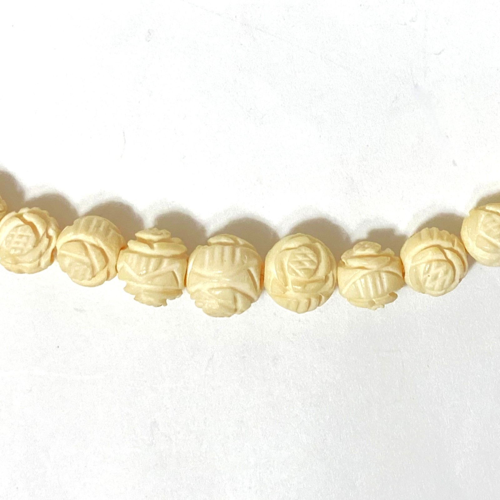 19″ Bovine Bone Necklace 29-Carved Rose, 50-Smooth Graduated Beads 4mm-22mm
