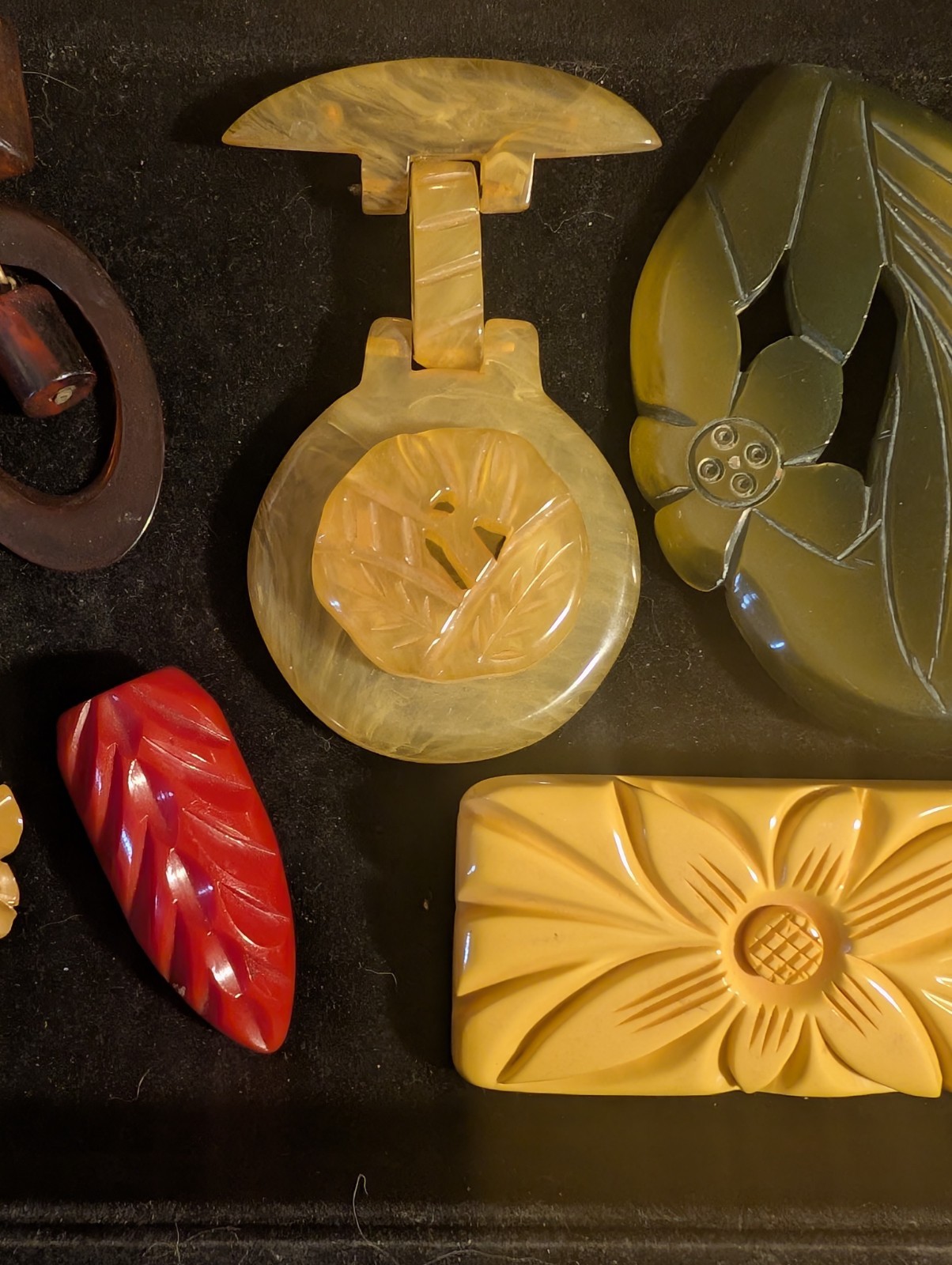 7 Vintage Bakelite Large Carved Pins, etc. Great colors, hand carved!