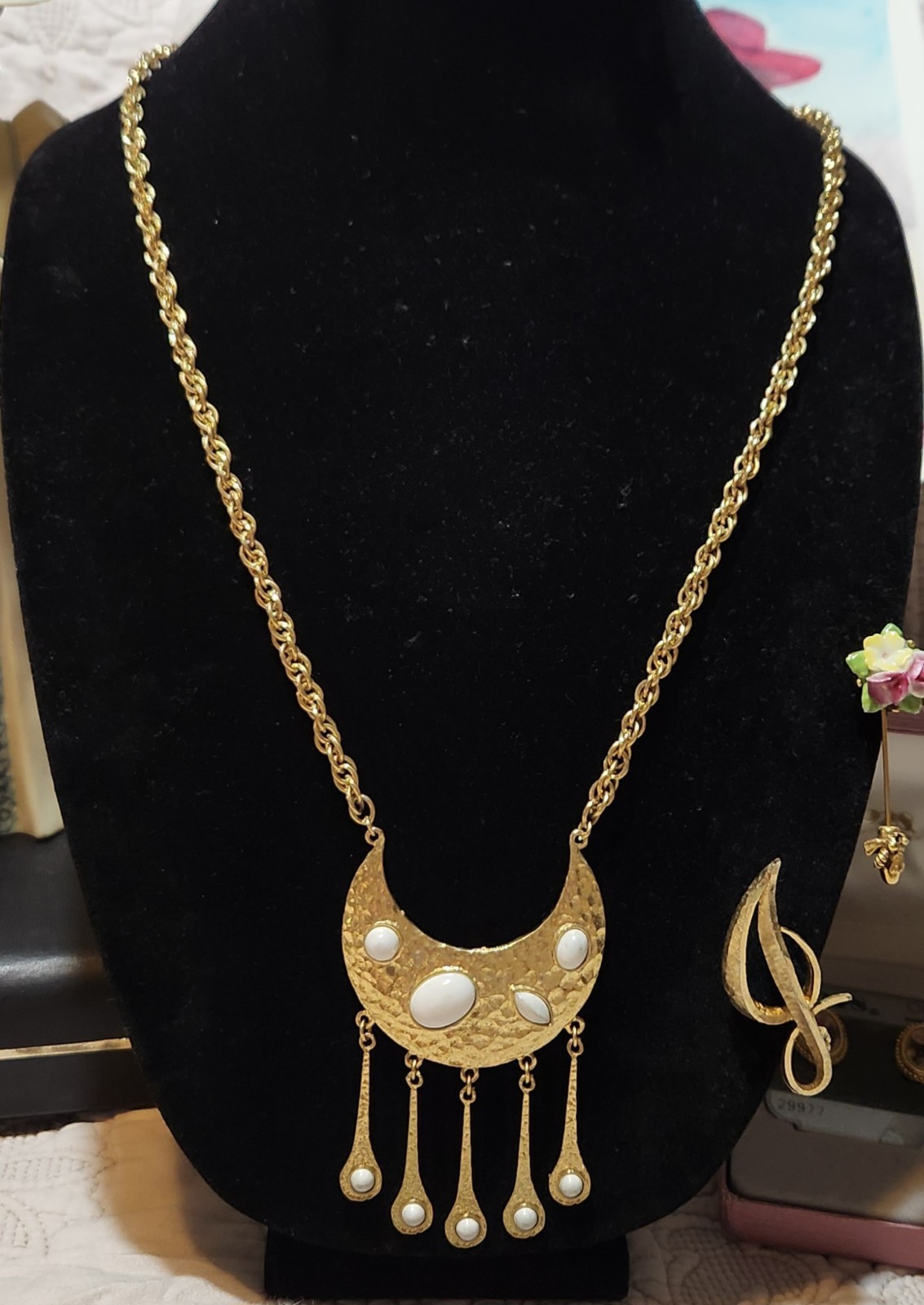 Vintage gold-toned necklace Crescent moon pendant with a hammered finish.